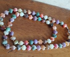 Necklace of multicolored artificial stones.