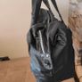 Large black expandable travel bag with shoulder strap Image 5
