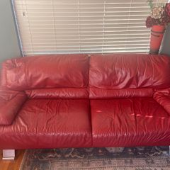 Red leather sofas x 2 plus ottoman