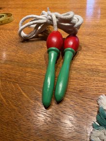 Vintage skipping rope with wooden handles