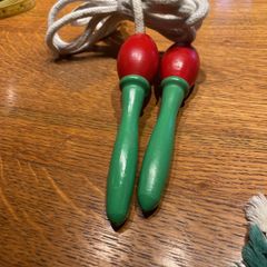 Vintage skipping rope with wooden handles