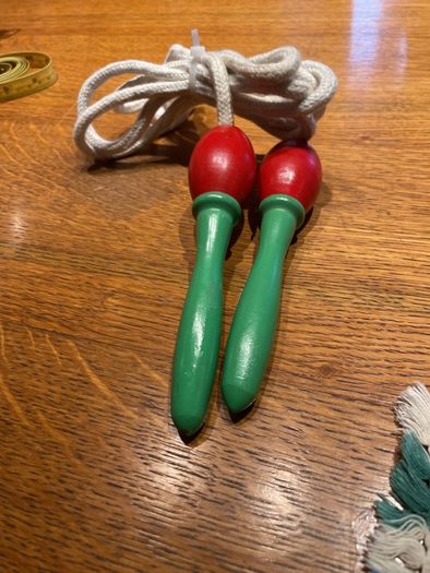 Vintage skipping rope with wooden handles
