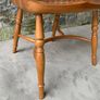 A large oak Windsor armchair. Image 4