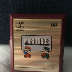 Rare vintage Mario bros game and watch 1983
