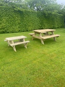 Handmade wooden picnic benches