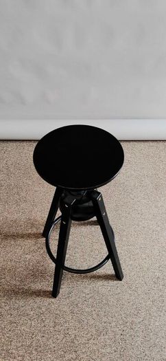 Black stool (studio photography)