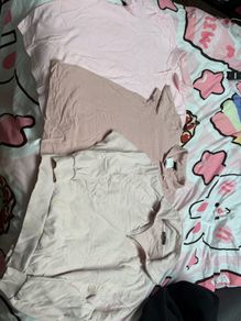 Three male pink T-shirts