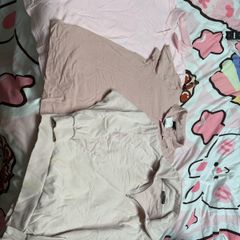 Three male pink T-shirts