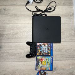 ps4 slim comes 1TB with 3 games all attachments included