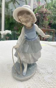 Vintage Nao porcelain figurine titled Girl with Hoop