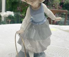 Vintage Nao porcelain figurine titled Girl with Hoop