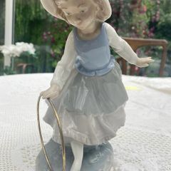 Vintage Nao porcelain figurine titled Girl with Hoop
