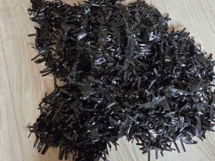 Black decorating tinsel, 23 meters