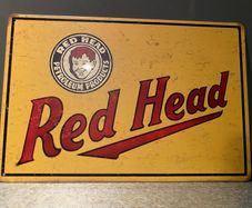 Red head petroleum products Tin metal sign