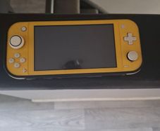 Nintendo switch Lite in yellow safety case and screen protector