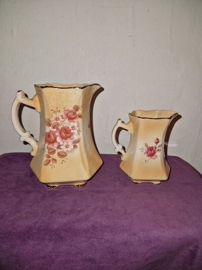 Antique pair of Rockingham Staffordshire floral jugs