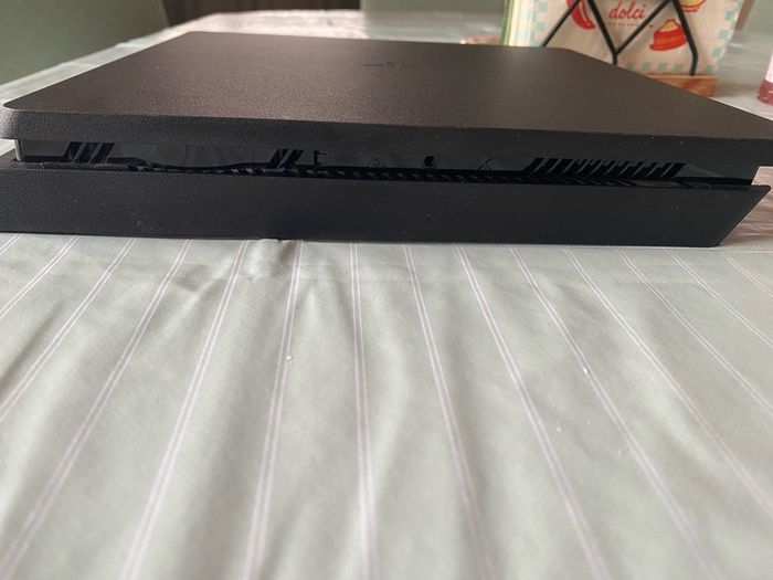 PlayStation 4 PS4 Console with controllers