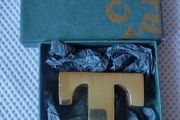 Initial T brass paperweight