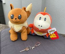 Two Pokemon plush - NEW Fuecoco & Eevee