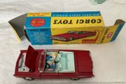 Corgi. Chrysler Imperial 246. With golf cart, driver snd passenger. Car and box are mint condition.