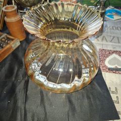 A Beautiful Amber Glass Oil Lamp Shade featuring a bulbous, ribbed body and a wide, ruffled, fluted rim, Postage Available
