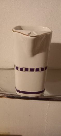 Silcut purple whiskey water jug