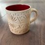 Unglazed Pottery Mug with Geometric Patterns Image 2