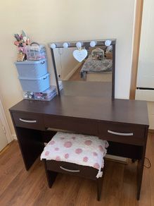 vanity table with lights and chair