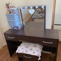 vanity table with lights and chair