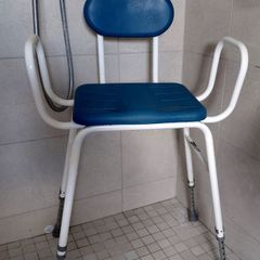 Adjustable shower seat