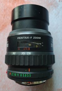 Pentax-F Zoom 28-80mm Camera Lens + Regent Skylight Filter