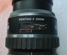 Pentax-F Zoom 28-80mm Camera Lens + Regent Skylight Filter
