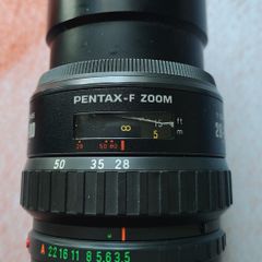 Pentax-F Zoom 28-80mm Camera Lens + Regent Skylight Filter