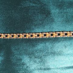 Two-tone metal bracelet.
