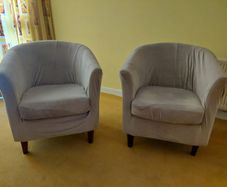Three chairs with covers