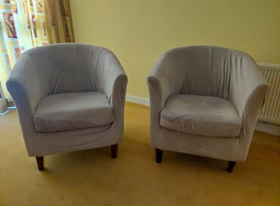 Three chairs with covers