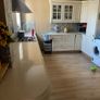 Quartz kitchen counters and Belfast sink Image 8