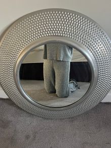 Large round silver textured mirror