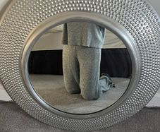 Large round silver textured mirror