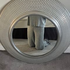 Large round silver textured mirror