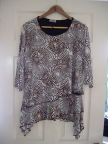 brown top with fringe bottom