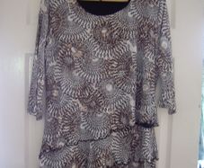brown top with fringe bottom