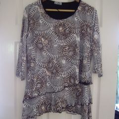 brown top with fringe bottom