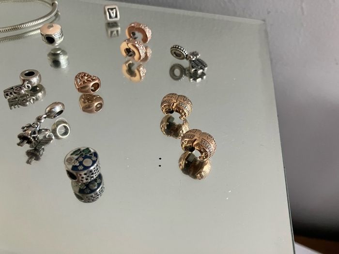 Assorted pandora charms and bracelets