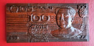 Carved wooden banknote. 100 yuan.