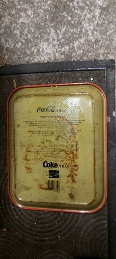 Coca cola metal drinks tray,used condition, see pictures for condition good solid used condition, nice display advertising item, buyer collects or pays postage thank you, sold as is ,front good ,back small bit of surface rust,,