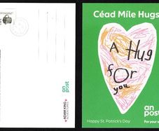 2022 Ireland An Post Adam King A Hug for you Postcard with definitive stamps tied 17th March 2022 (St Patrick's Day)