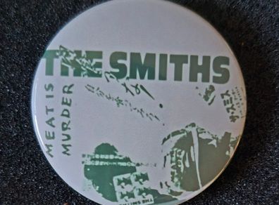 The smith's , pin back button badge.