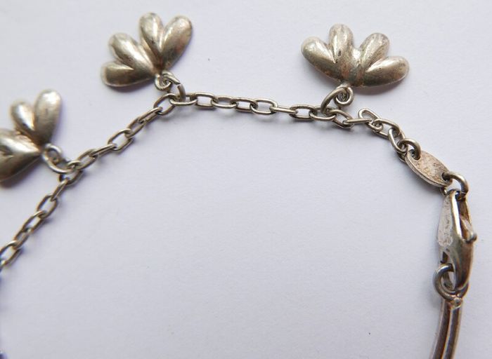 Vintage 925 Sterling Silver charm bracelet with flower charms