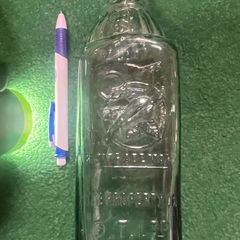 Aqua green Australian chili bottle , 1910